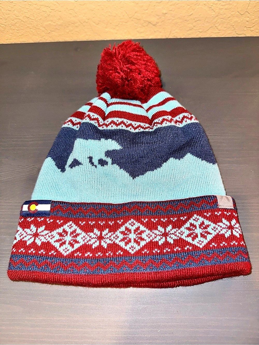 Cirque Colorado Flag Knit Pom Beanie Red Blue
